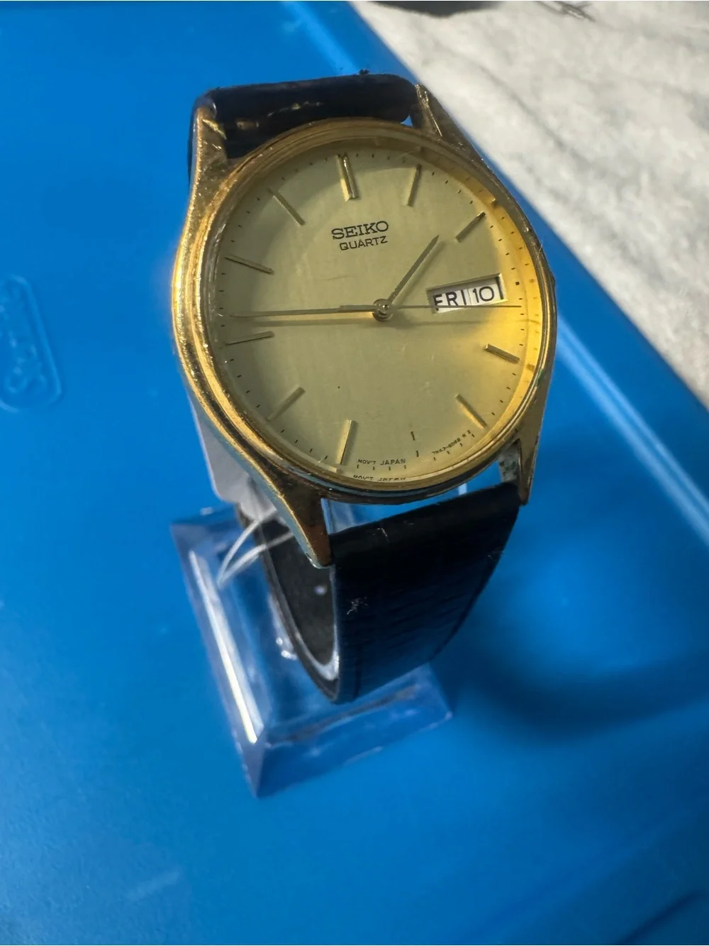 Seiko Gold Dial Watch with Black Strap